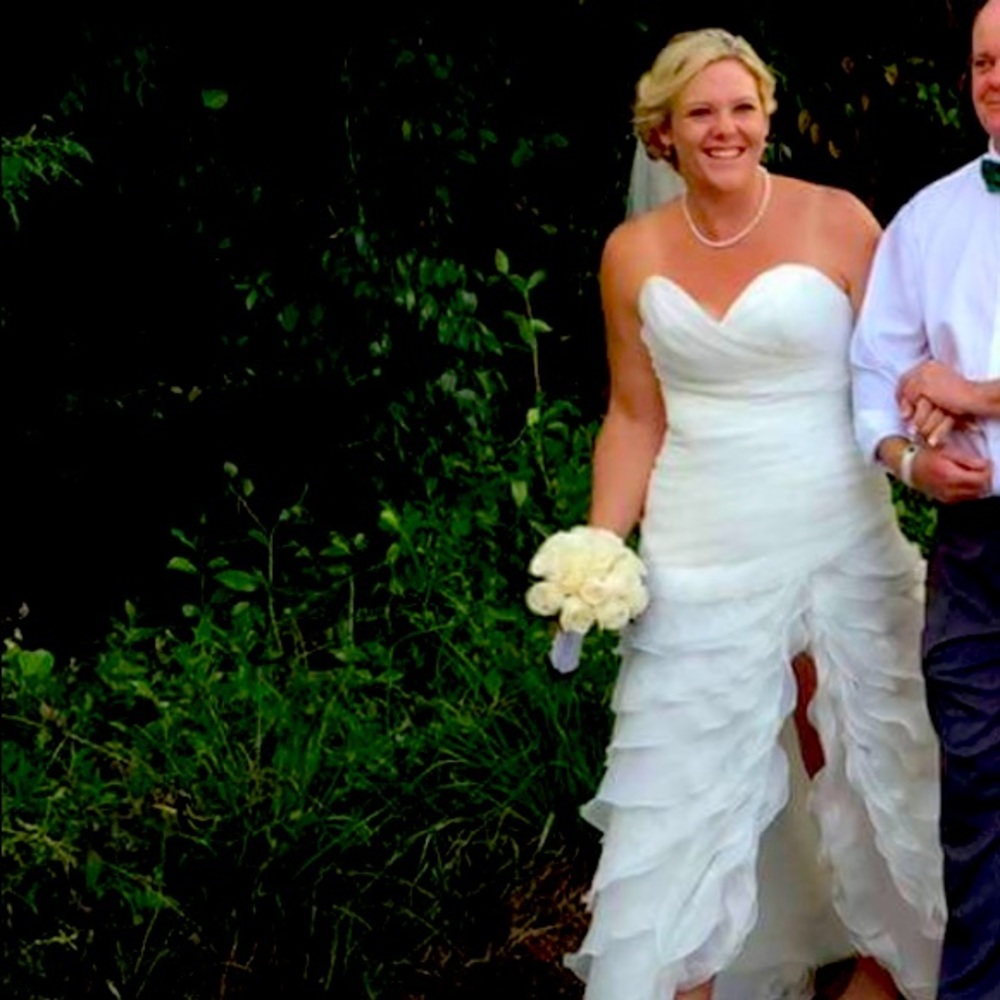 Papilio Garden Collection wedding dress with sweetheart neck and slit up the leg